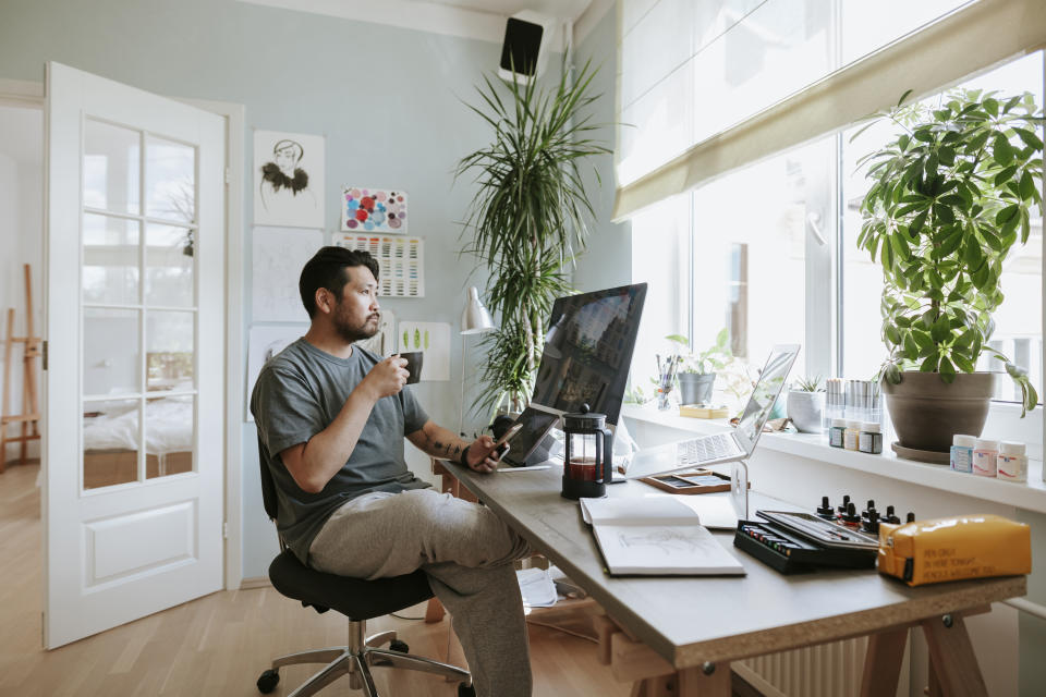 A digital artist from Japan takes a coffee break at home