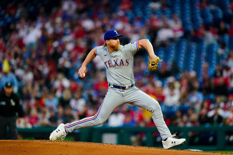 Texas Rangers' Jon Gray winds up during the third inning of the team's baseball game against the Philadelphia Phillies on Tuesday, May 3, 2022, in Philadelphia. (AP Photo/Matt Rourke)