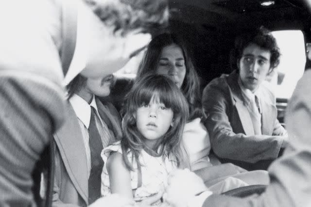 <p>Globe Photos/ï»¿ZUMAPRESS.com</p> Owen sitting in Russ' lap at her mom's funeral service in 1974