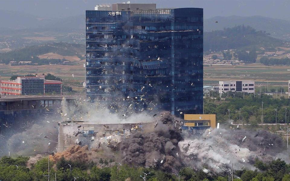 This photo provided by the North Korean government shows the demolition of an inter-Korean liaison office building in Kaesong, North Korea - KCNA via KNS 