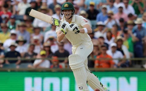 Steve Smith hits the ball which brings up his double-century - Credit: Trevor Collens/AP