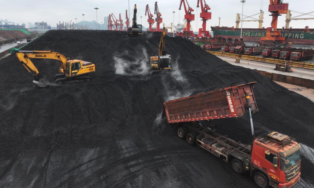 <span>The coal terminal at Lianyungang port, in the eastern Jiangsu province of China; 80% of Chinese citizens want a quick green transition, the UN poll found. </span><span>Photograph: AFP/Getty Images</span>