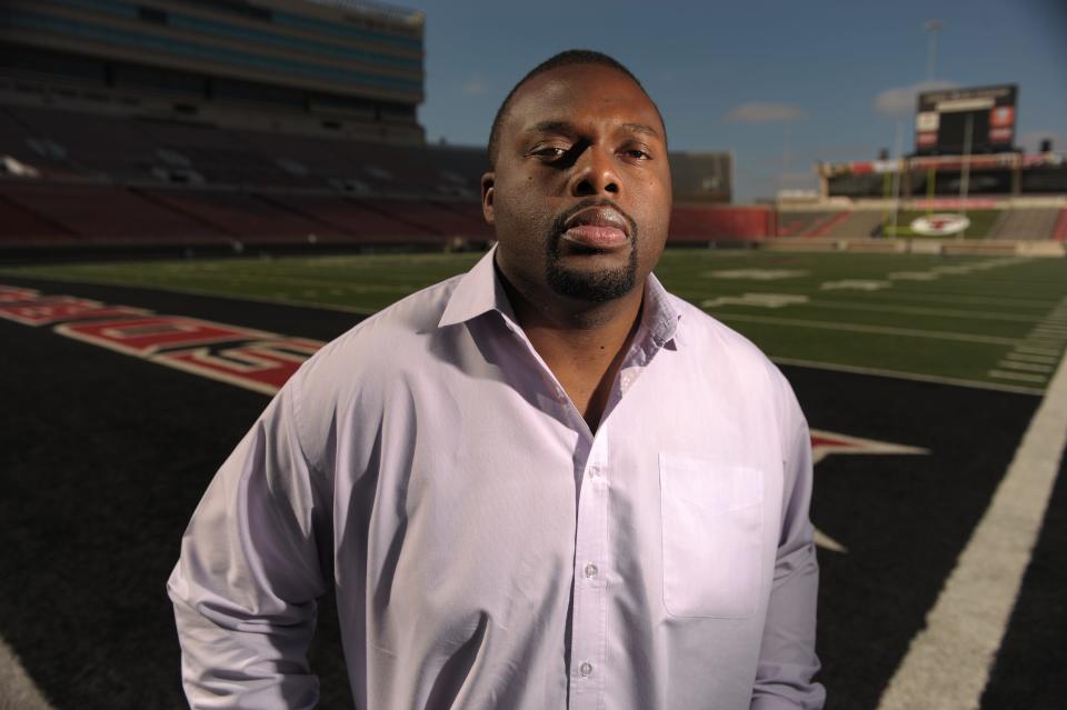 Former Texas Tech football player Patrice Majondo-Mwamba stands in the south endzone, Friday Oct. 9 2009, at Jones AT&T Stadium. He has played professional football in the NFL in Europe and the U.S. While continuing to train for NFL camps he is actively involved in several family business and is the president of the Mwamba Family Foundation, a charity committed to helping children in his native country of The Democratic Republic of Congo.