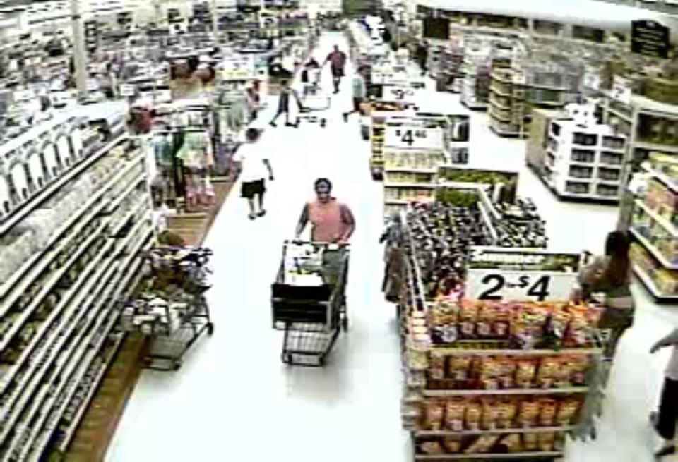 Surveillance video shows Lori Ann Slesinski shopping in an Alabama Walmart on June 10, 2006.  