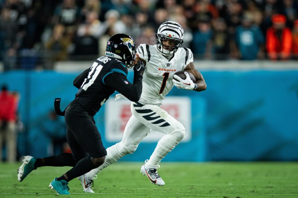 Cincinnati Bengals wide receiver Ja'Marr Chase (1) runs with the ball after the catch against the Jacksonville Jaguars.