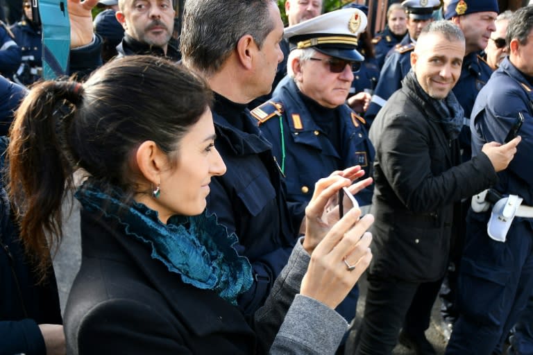 The raid is a coup for Rome mayor Virginia Raggi (L) who has been repeatedly blamed for the city's degradation