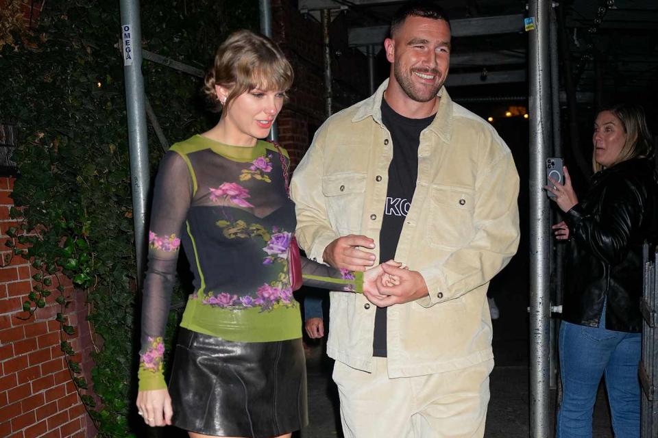 <p>Gotham/GC Images</p> Taylor swift and Travis Kelce in New York City in October 2023
