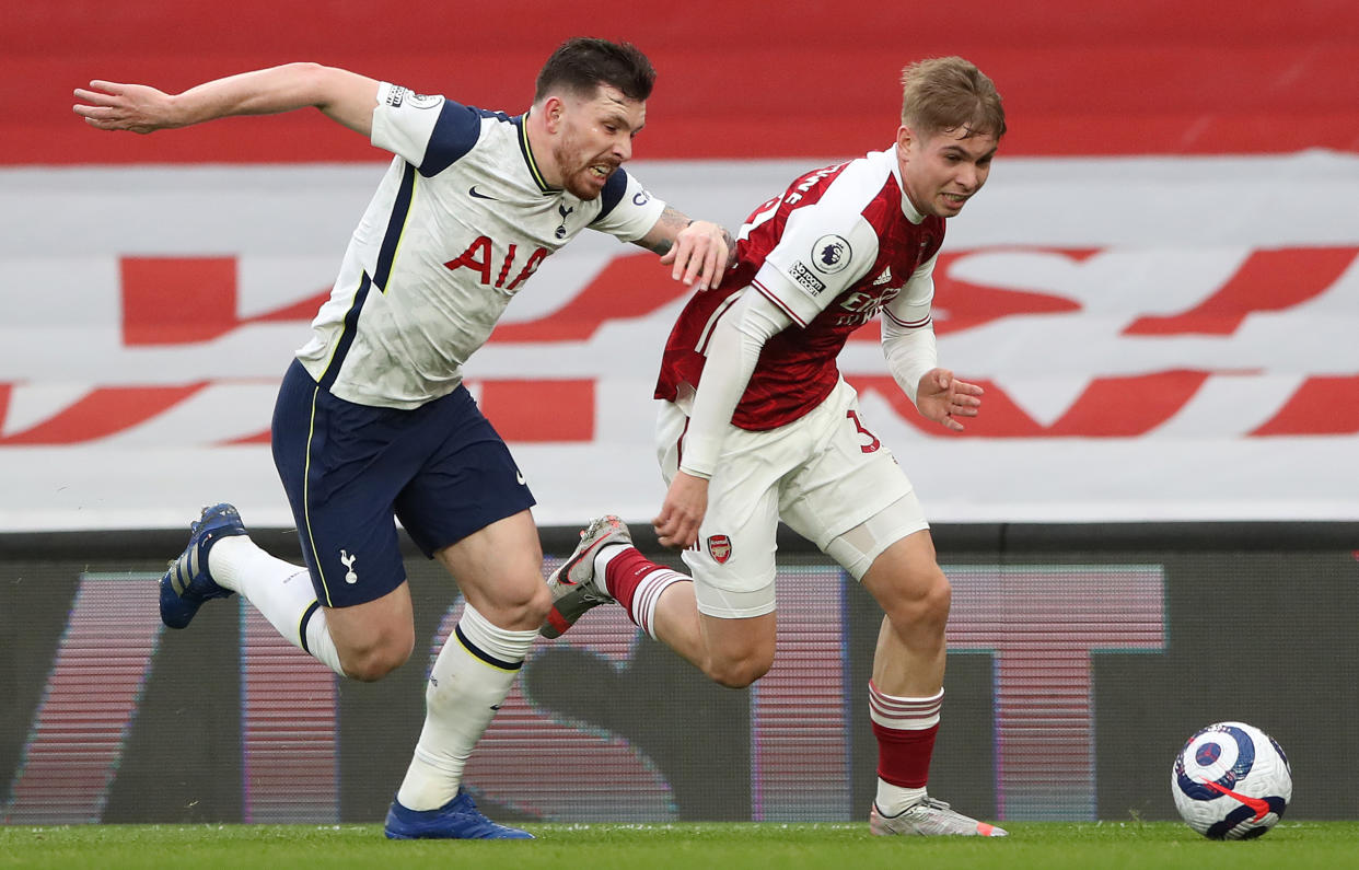 Arsenal's Emile Smith Rowe gets away from Tottenham Hotspur's Pierre-Emile Hojbjerg during the Premier League match at Emirates Stadium, London. Picture date: Sunday March 14, 2021.