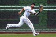 Pittsburgh Pirates right fielder Edward Olivares catches a fly ball by Los Angeles Angels' Logan O'Hoppe for an out during the second inning of a baseball game in Pittsburgh, Monday, May 6, 2024. (AP Photo/Gene J. Puskar)