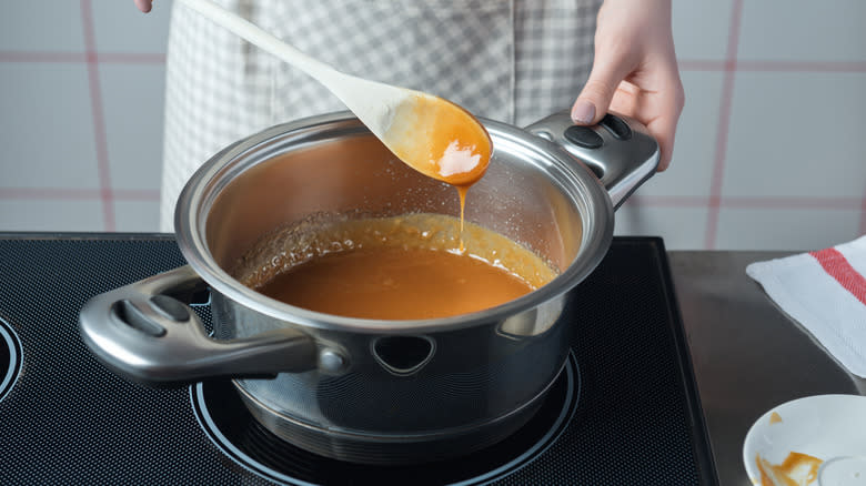 wooden spoon in caramel