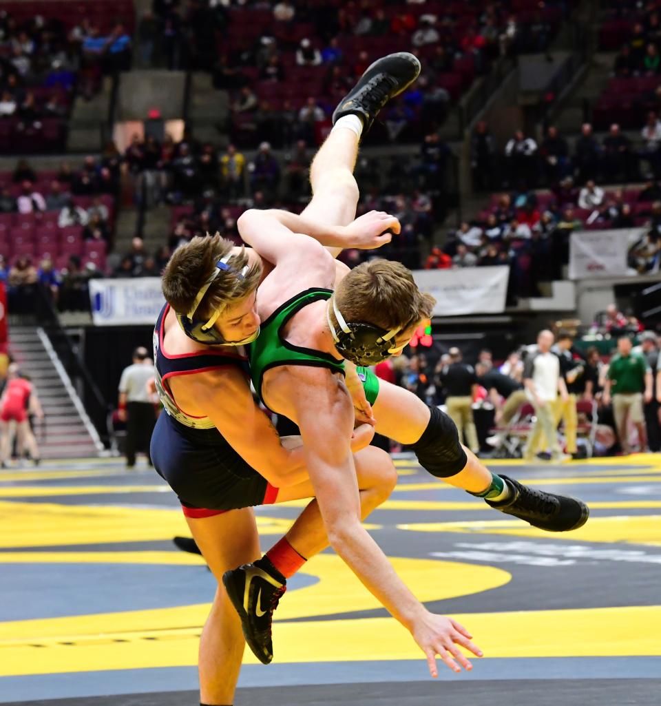 Norwwod's Wyatt Hinton takes down Landon Litermoot of Delta in consolation third-place action in Division II wrestling at the OHSAA 86th annual boys wrestling state tournament March 10-12, 2023.