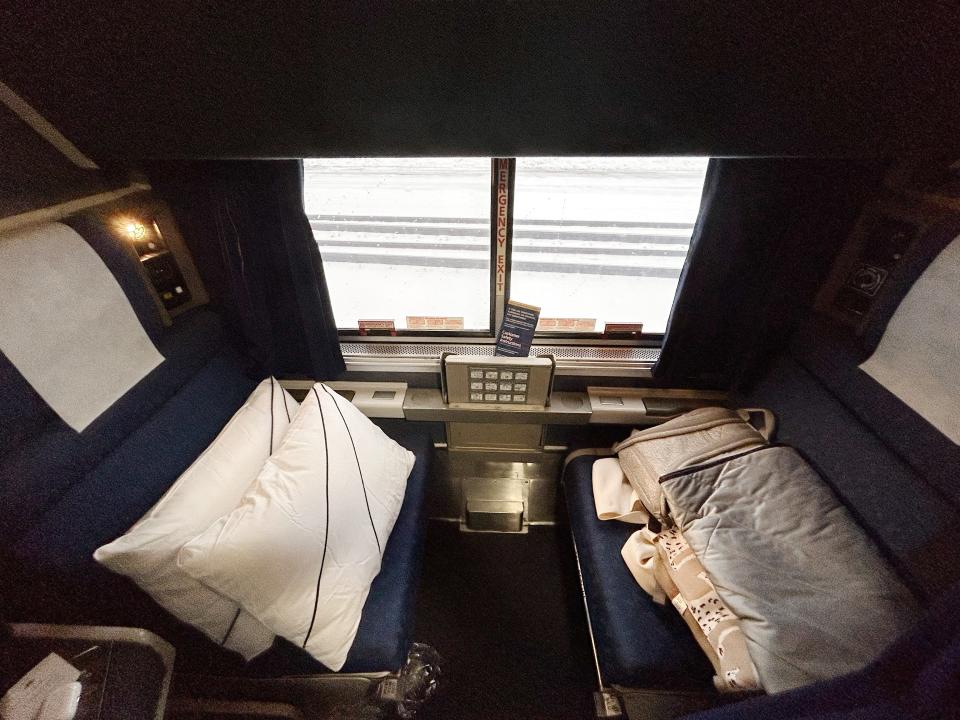 Two seats in an Amtrak roomette.