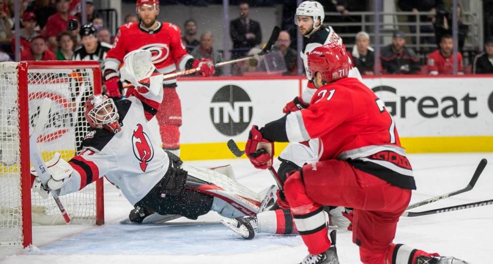 The New Jersey Devils goalie Akira Schmid (40) deflects a shot on goal in the first period against the Carolina Hurricanes during Game 5 of their second round Stanley Cup playoff series on Thursday, May 11, 2023 at PNC Arena in Raleigh, N.C.