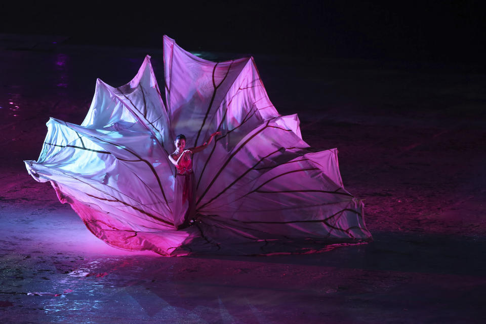 A dancer performs during the opening ceremony of the 31st Southeast Asian Games in Hanoi, Vietnam Sunday, May 12, 2022. The SEA Games 31 takes place from May 12 to May 23 in Hanoi, and 11 nearby provinces. (AP Photo/Minh Hoang)