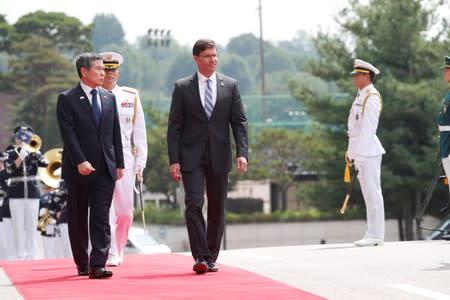 U.S. Secretary of Defense Mark Esper and South Korean Defence Minister Jeong Kyeong-doo inspect a guard of honor during a welcoming ceremony at the Defense Ministry in Seoul
