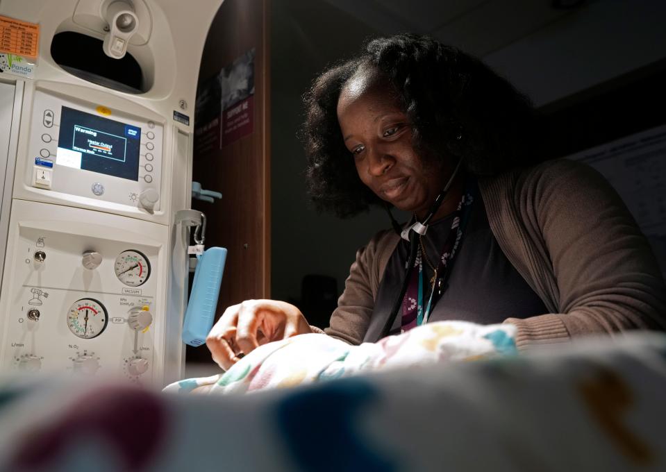 Jan. 30, 2024; Grove City, Ohio, USA; 
Mount Carmel Nurse Manager Jatu Boikai demonstrates the assessments an infant would receive after being born.