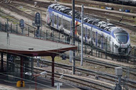 A new Regiolis regional train made by power and train-making firm Alstom, is seen next to a platform at Strasbourg's railway station, May, 21, 2014. REUTERS/Vincent Kessler