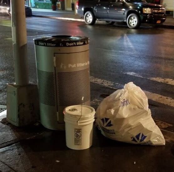 The second bucket containing a cat, left near a public trash can on a corner near Animal Haven. (Photo: Animal Haven)