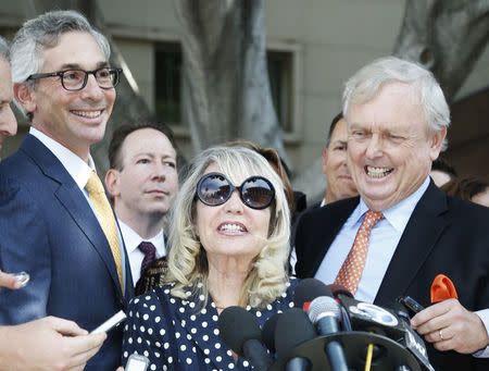 Shelly Sterling, 79, (C) speaks at a news conference with her lawyer Pierce O'Donnell (R) and Steve Ballmer's lawyer Adam Streisand (L) in Los Angeles, California July 28, 2014. REUTERS/Lucy Nicholson