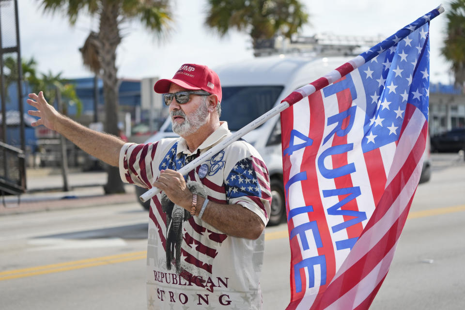 Willy Guardiola, a supporter of former President Donald Trump attends a rally, Monday, April 3, 2023, in West Palm Beach, Fla. (AP Photo/Wilfredo Lee)