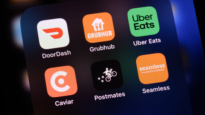 Delivery app icons on a phone
