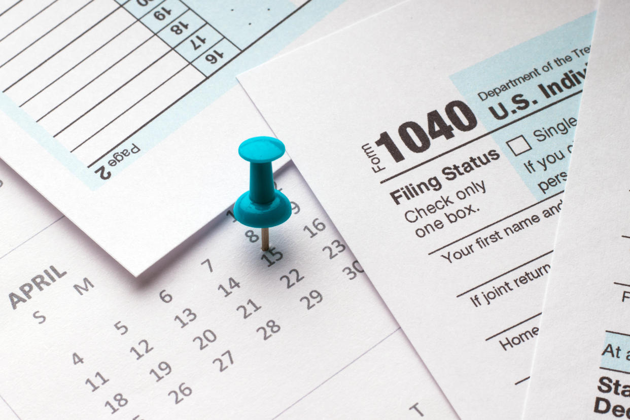 Blue pin marks the tax filing date on the calendar