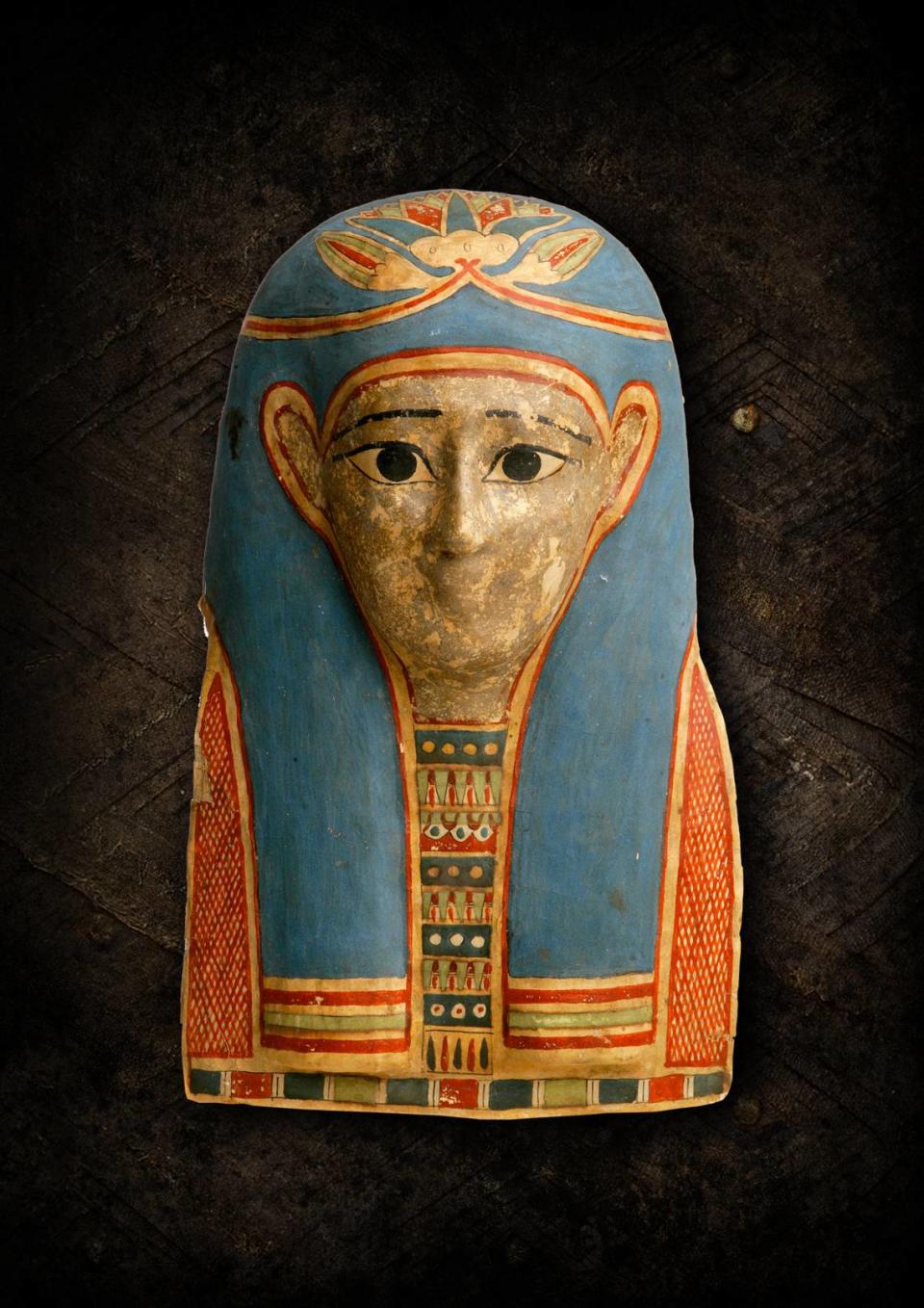 Egyptian, from Hawara, Mummy mask, 332–30 B.C.E., plaster and linen, Manchester Museum. This is one of a series of mold-made masks, built up from layers of linen and plaster.