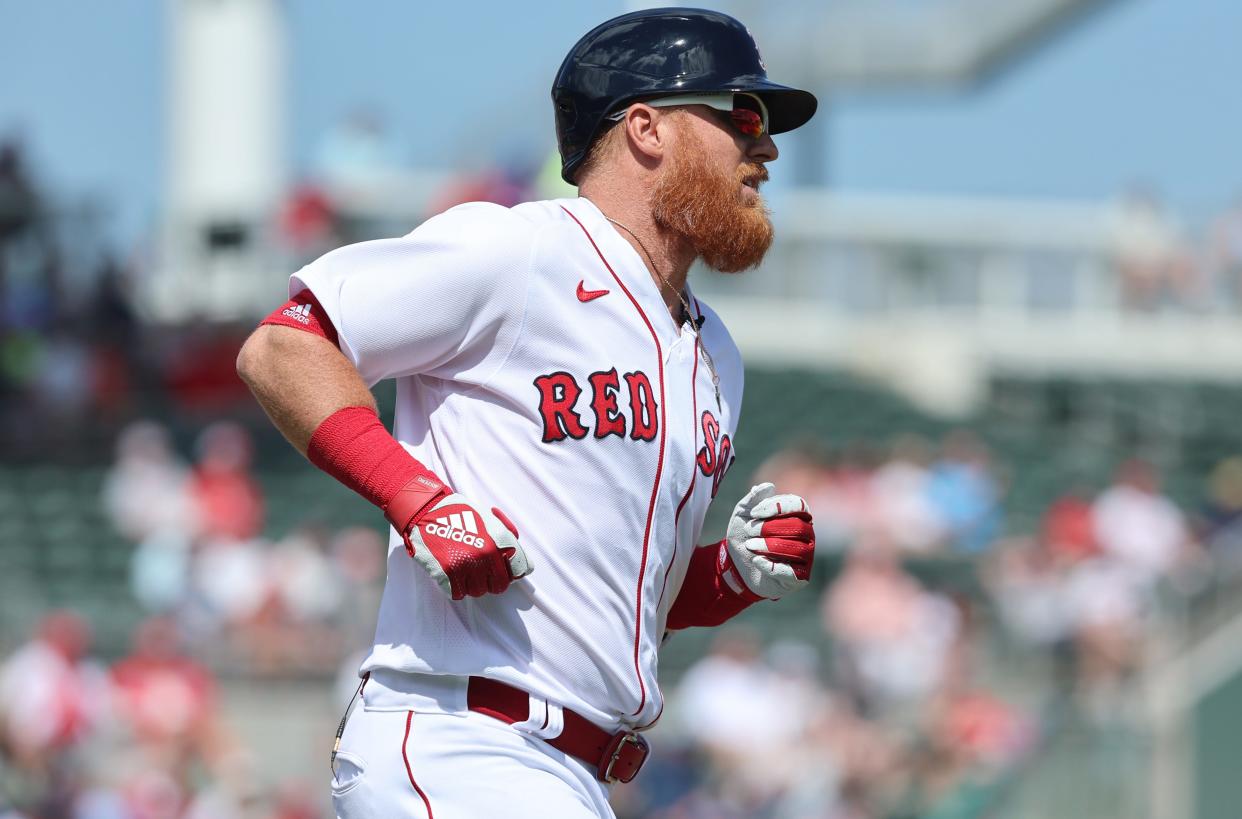 Mar 2, 2023; Fort Myers, Florida, USA; Boston Red Sox third baseman Justin Turner (2) singles during the first inning against the Philadelphia Phillies at JetBlue Park at Fenway South. Mandatory Credit: Kim Klement-USA TODAY Sports