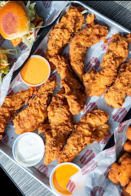 Diners who purchase chicken fingers at Savvy Sliders on Saturday, July 27 will get a second order of hand-breaded chicken fingers for free. The promotion is a part of the Michigan chain's celebration of National Chicken Finger Day.