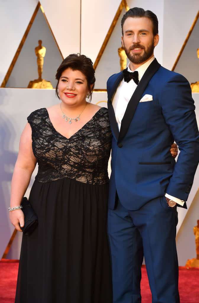 Chris Evans and his sister Shanna Evans on the Oscars red carpet. (Photo: Getty Images)