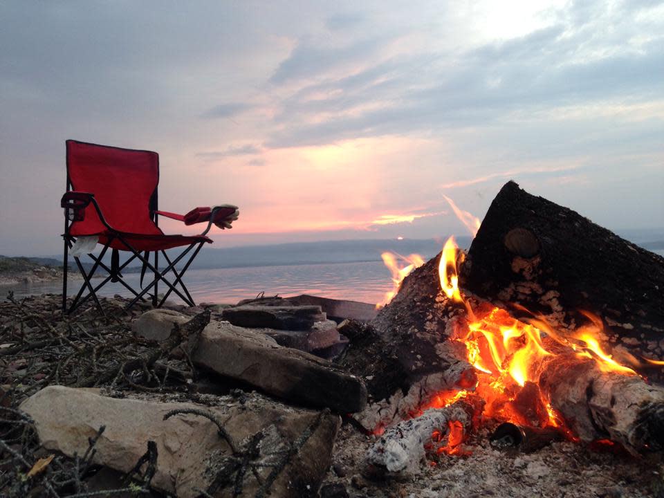 NWT Fire warns against leaving campfires unattended after a fire spotted near Dettah is thought to be the result of an abandoned campfire. The fire information officer says fire season is here and urges residents to do their part. (Andrew Pacey/CBC - image credit)