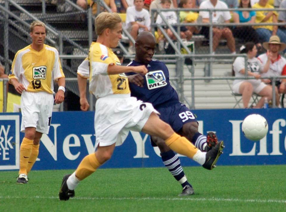 (7/29/00,twr,MLS, Columbus, Ohio) soccer -- #27 Dario Brose and Dante Washington battle for the ball in the second half of the MLS All-star game. Revell/Photo all names are (cq).