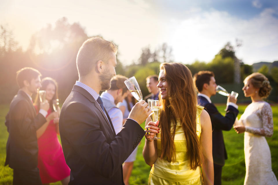 Is it tacky not to have a free bar at your wedding? [Photo: Getty]