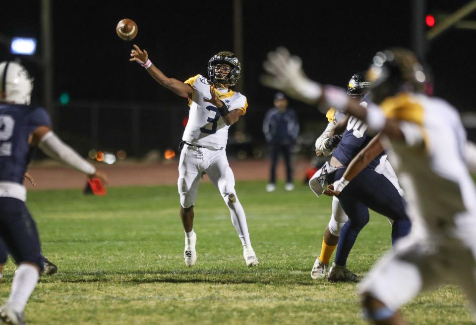 The Desert Hot Springs quarterback Messiah Smith throws against Jurupa Valley in Desert Hot Springs, Calif., Nov. 3, 2023.