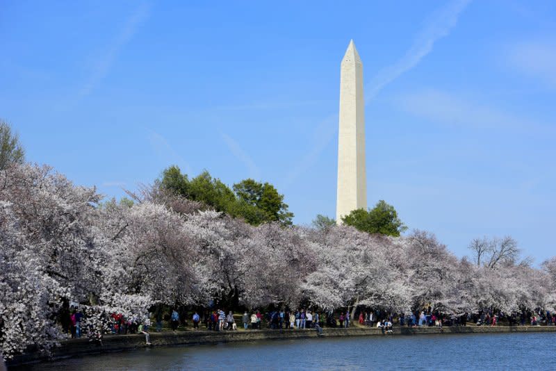 Cherry blossoms bloom along the Tidal Basin in front of the Washington Monument in Washington, D.C. on April 6. On May 3, 1802, Washington, D.C., was incorporated. File Photo by Leigh Vogel/UPI