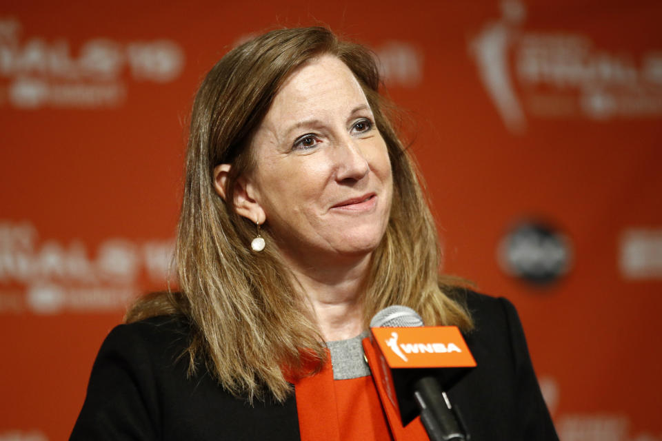 FILE - In this Sept. 29, 2019, file photo, WNBA Commissioner Cathy Engelbert speaks at a news conference in Washington. The WNBA and its union announced a tentative eight-year labor deal Tuesday, Jan. 14, 2020, that will allow top players to earn more than $500,000 while the average annual compensation for players will surpass six figures for the first time. I call it historic," WNBA Commissioner Cathy Engelbert said in a phone interview. (AP Photo/Patrick Semansky, File)