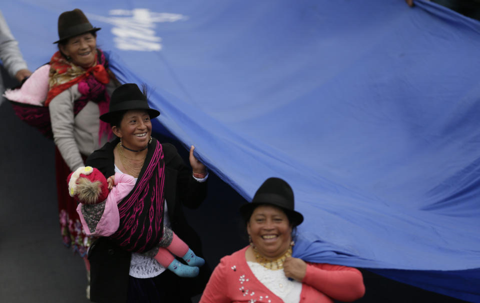 In this Nov. 14, 2018 photo, The March of Water, called by Indigenous organizations, arrives to Quito, Ecuador. This march is to demand that the government pay attention to water rights, specially in places where there is mining activity. (AP Photo/Dolores Ochoa)