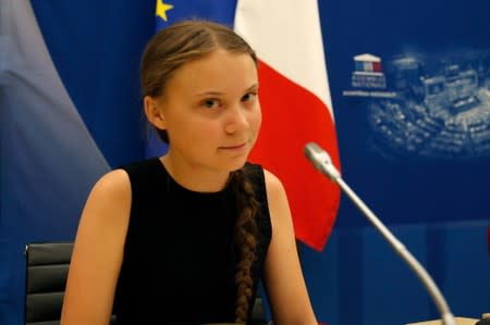 Swedish environmental activist Greta Thunberg attends a debate with French parliament members at the National Assembly in Paris
