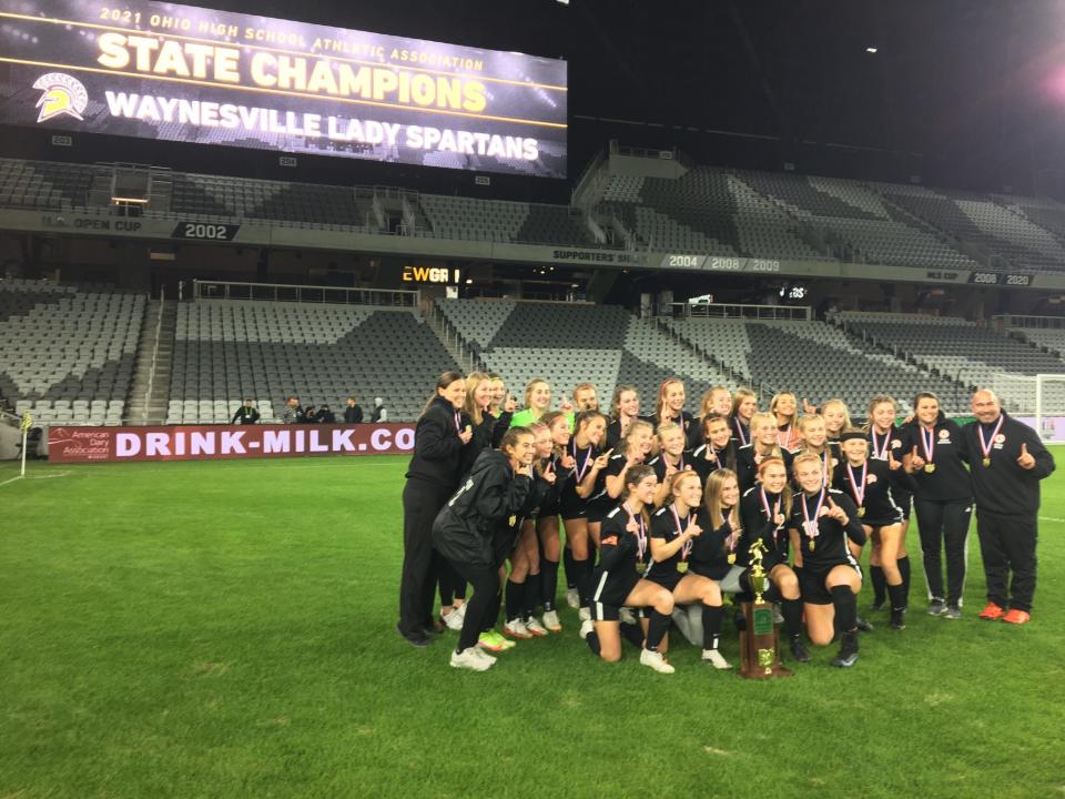 Waynesville poses with its state championship trophy, Nov. 12, 2021.