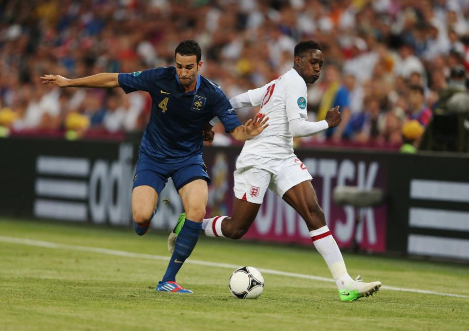 Danny Welbeck of England fights for the ball Adil Rami of France during the UEFA EURO 2012 group D match between France and England at Donbass Arena.