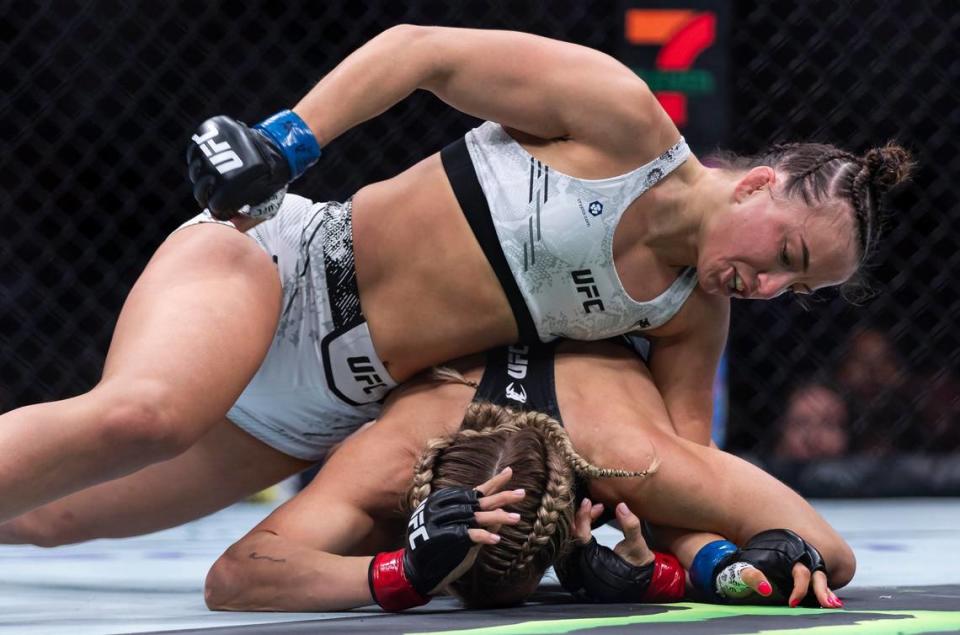 Katlyn Cerminara of the United States fights against Maycee Barber of the United States during their women’s flyweight title match during the UFC 299 event at the Kaseya Center on Saturday, March 9, 2024, in downtown Miami, Fla. MATIAS J. OCNER/mocner@miamiherald.com
