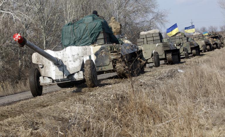 Ukrainian armoured vehicles and artillery near the eastern city of Soledar, on February 27, 2015