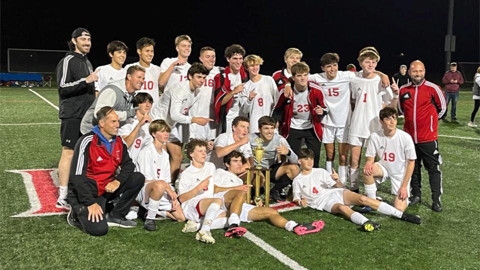 Members of the Haddon Township boys soccer team pose with the South Jersey Coaches Association Tournament trophy, which they captured with a shootout win over Shawnee after the teams battled to a 1-1 draw at the DeCou Soccer Complex in Cherry Hill on Saturday, October 22, 2022.