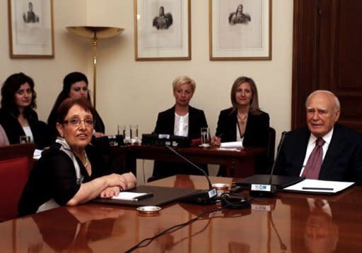 General Secretary of the Greek Communist Party Aleka Papariga meets with Greece's President Carolos Papoulias (R) at the presidential palace in Athens. Greek political party leaders emerged late Sunday from emergency cabinet talks with no breakthrough in sight, raising the prospect of new elections that could scupper reforms and force the country out of the eurozone