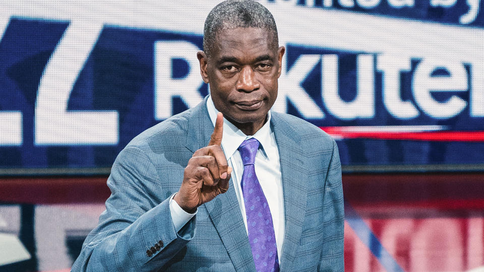 Dikembe Mutombo flashes his signature finger-wag ahead of an NBA pre-season game in Japan earlier in October.