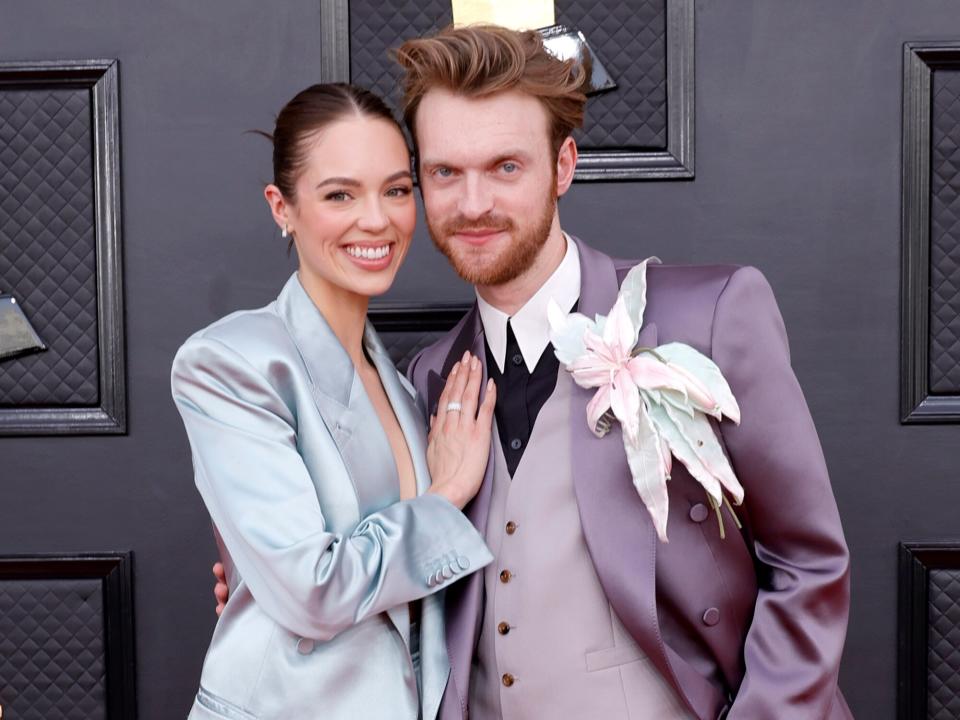 Claudia Sulewski and FINNEAS attend the 64th Annual GRAMMY Awards at MGM Grand Garden Arena on April 03, 2022 in Las Vegas, Nevada