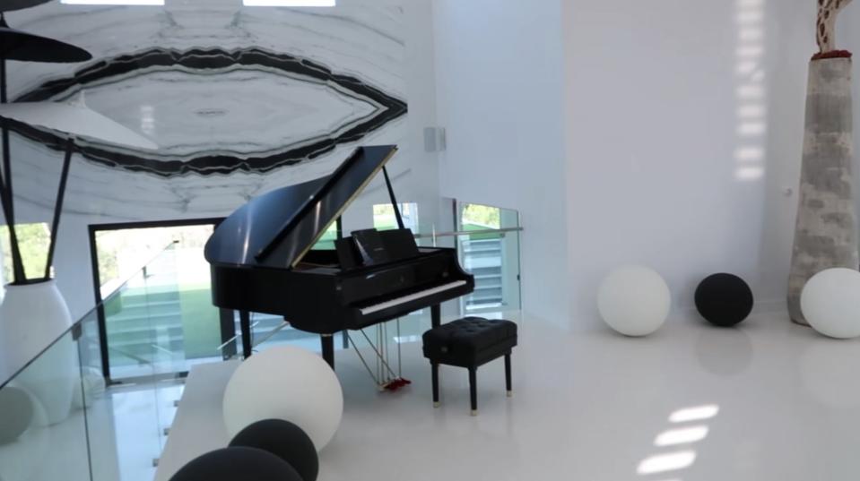 The Steinway baby grand piano inside the entry could cost upward of $35,000.
