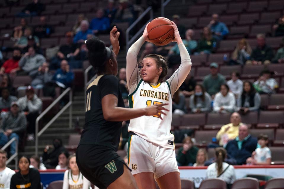 Lansdale Catholic junior Gabby Casey looks to pass at Giant Center in Hershey on Thursday, March 24, 2022. Archbishop Wood defeated Lansdale Catholic in PIAA title game in class 4A. 