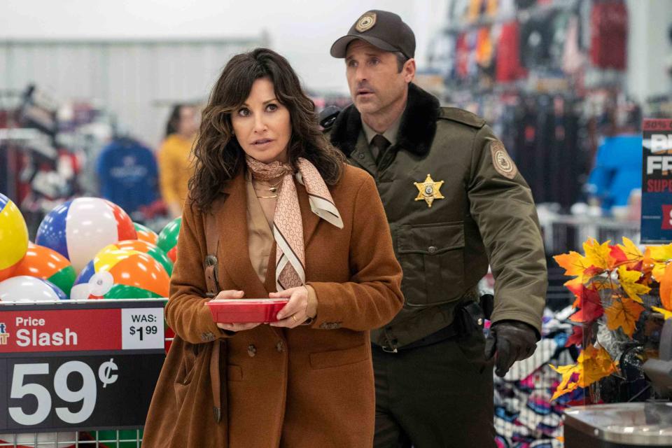 <p>Pief Weyman / TriStar Pictures / Courtesy Everett Collection</p> Gina Gershon and Patrick Dempsey in "Thanksgiving" (2023)