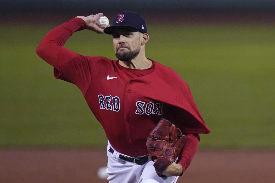 Boston Red Sox starting pitcher Nathan Eovaldi delivers during the first inning of the team's baseball game against the Tampa Bay Rays, Tuesday, Oct. 4, 2022, at Fenway Park, in Boston. (AP Photo/Charles Krupa)